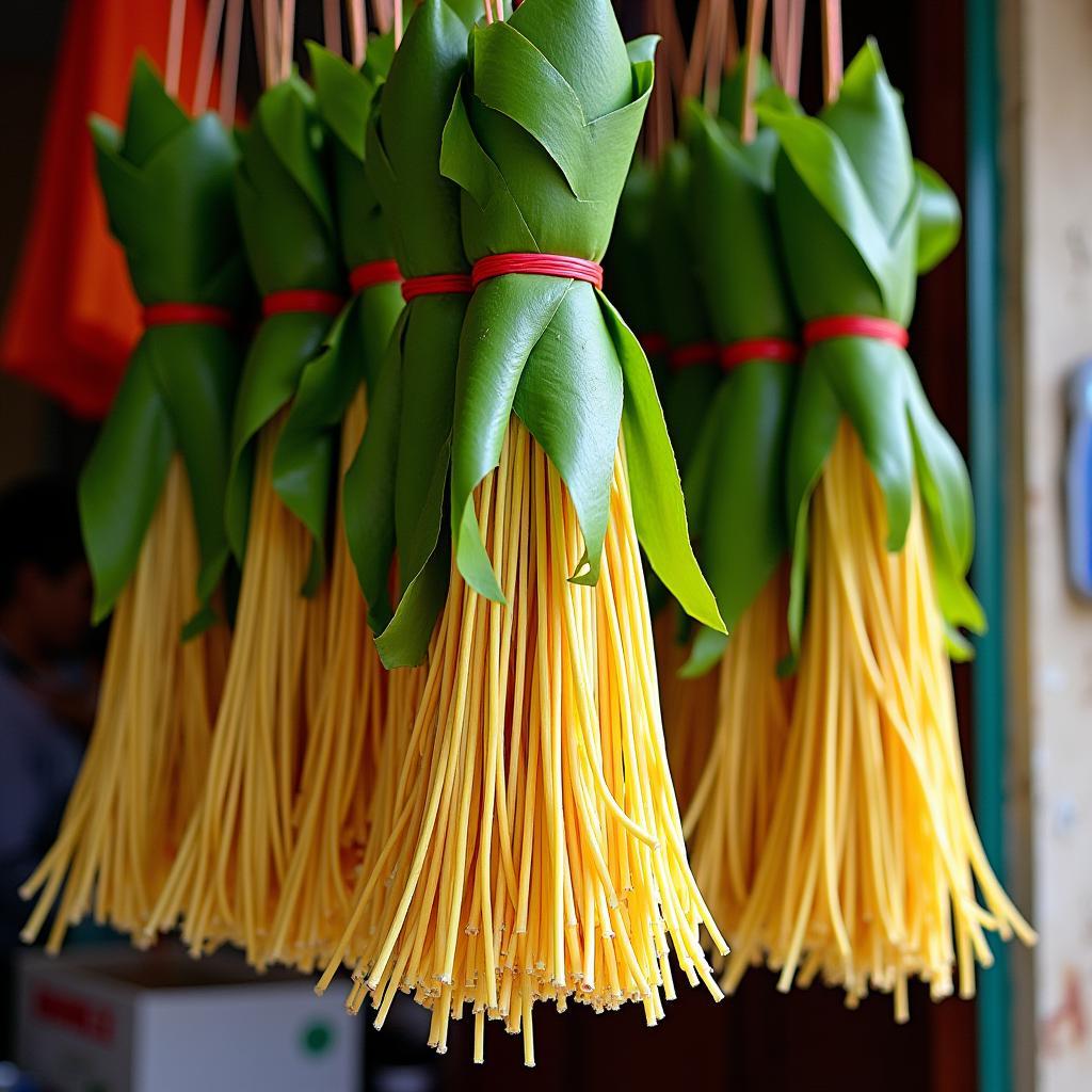 Những chùm nem chua Thanh Hóa được treo ngay ngắn tại một cửa hàng đặc sản, sẵn sàng để du khách mua về làm quà xứ Thanh.